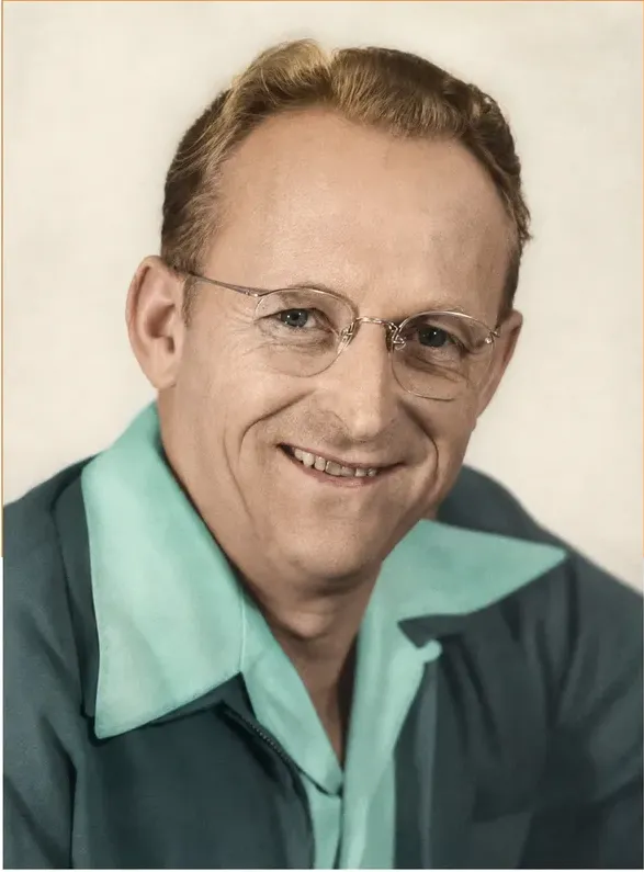 The same 1950s-1970s photo restored by hand at MemoryCherish, water damage corrected and clarity brought back