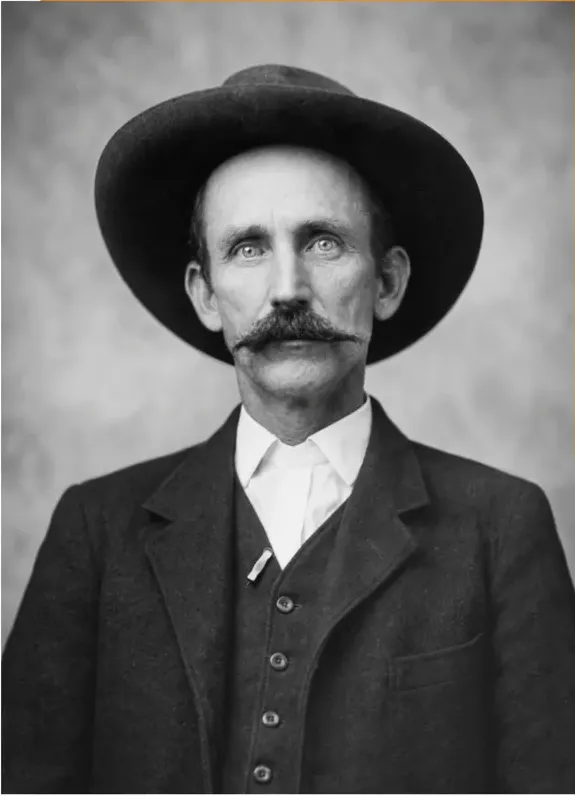 The same pre-1950 photograph after hand restoration by MemoryCherish, water damage repaired and detail recovered