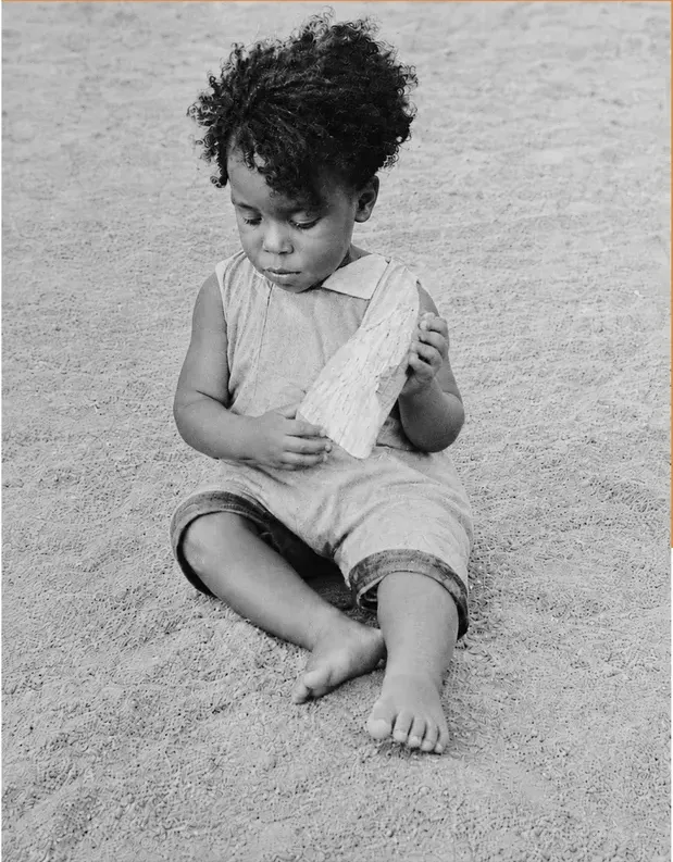 The same pre-1950 photo restored by hand at MemoryCherish, scratches corrected and clarity brought back