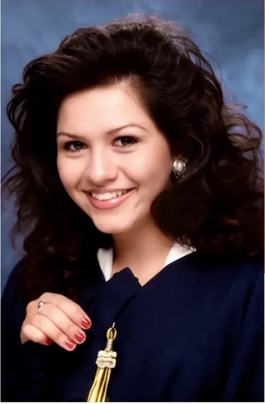 The same 1980s-plus photograph after hand restoration by MemoryCherish, discoloration repaired and detail recovered