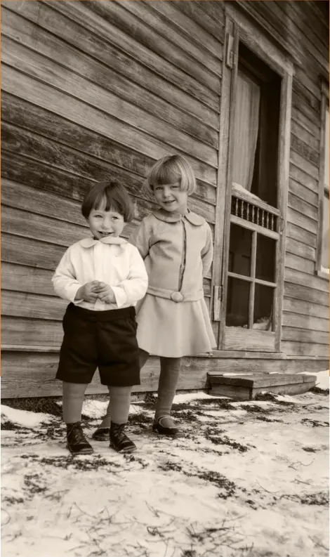 The same pre-1950 photograph after hand restoration by MemoryCherish, fading repaired and detail recovered