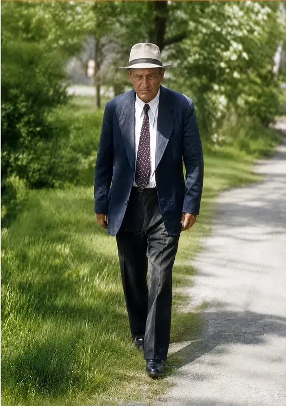 The same pre-1950 photograph after hand colorization by MemoryCherish, natural color added