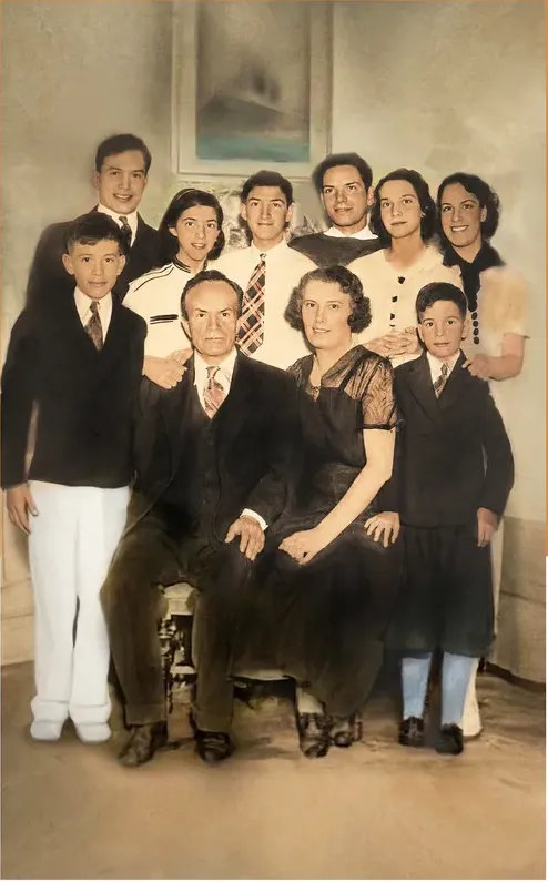 The same pre-1950 photo restored by hand at MemoryCherish, water damage corrected and clarity brought back