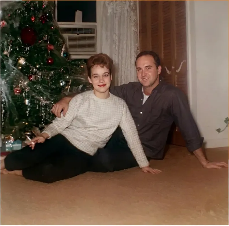 The same 1950s-1970s photograph after hand restoration by MemoryCherish, creases and tears repaired and detail recovered