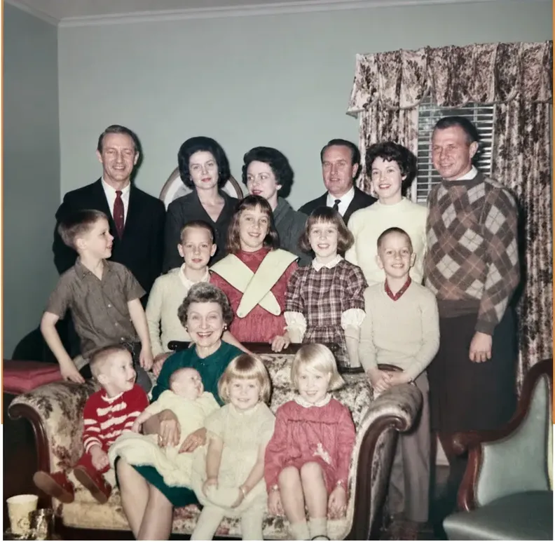 The same 1950s-1970s photo restored by hand at MemoryCherish, creases and tears corrected and clarity brought back