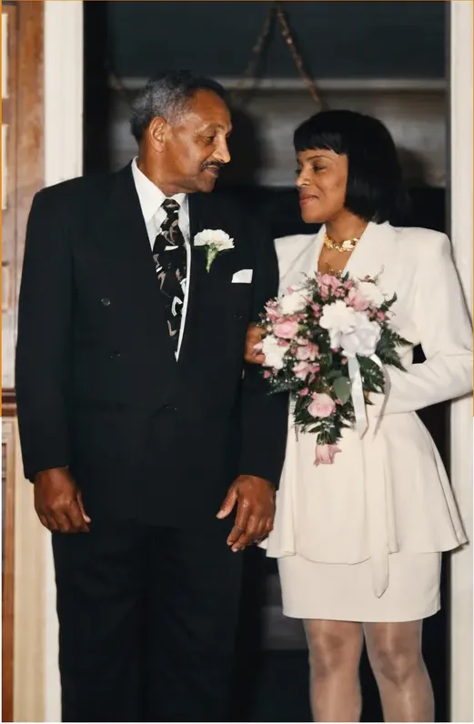 The same 1980s-plus photograph after hand restoration by MemoryCherish, discoloration repaired and detail recovered