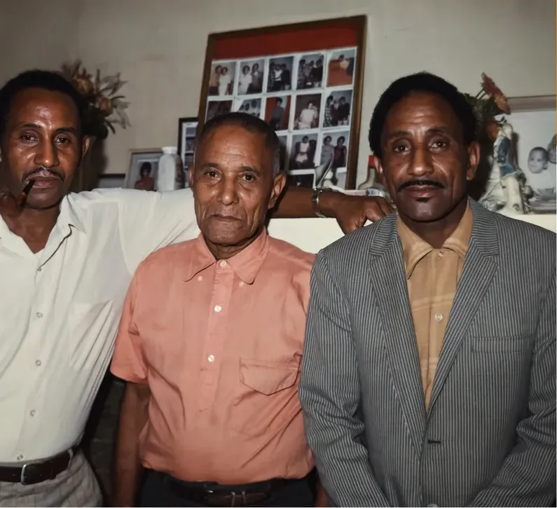 The same 1980s-plus photograph after hand restoration by MemoryCherish, discoloration repaired and detail recovered