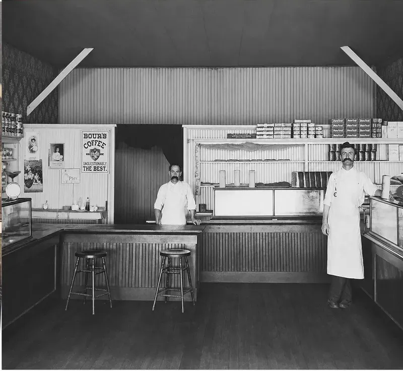 The same pre-1950 photo restored by hand at MemoryCherish, creases and tears corrected and clarity brought back