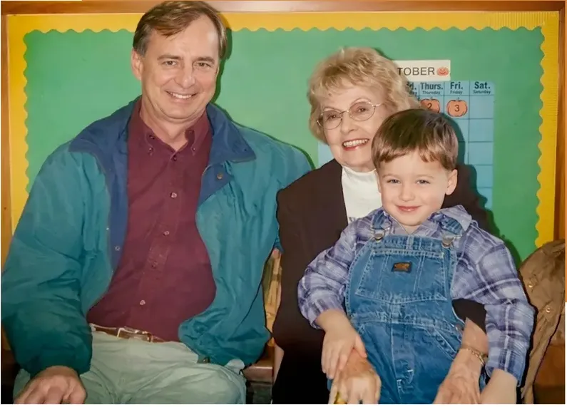 The same 1980s-plus photo restored by hand at MemoryCherish, discoloration corrected and clarity brought back