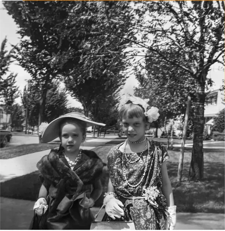 The same 1950s-1970s photograph after hand restoration by MemoryCherish, stains and marks repaired and detail recovered
