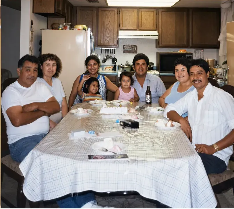 The same 1980s-plus photograph after hand restoration by MemoryCherish, discoloration repaired and detail recovered