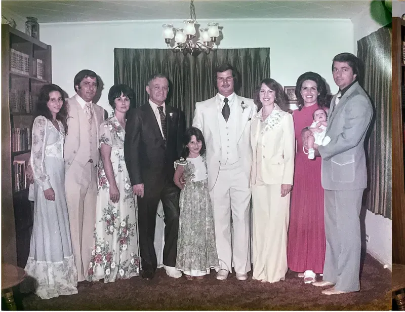 Discoloration on a 1950s-1970s photograph, before hand restoration by MemoryCherish artists