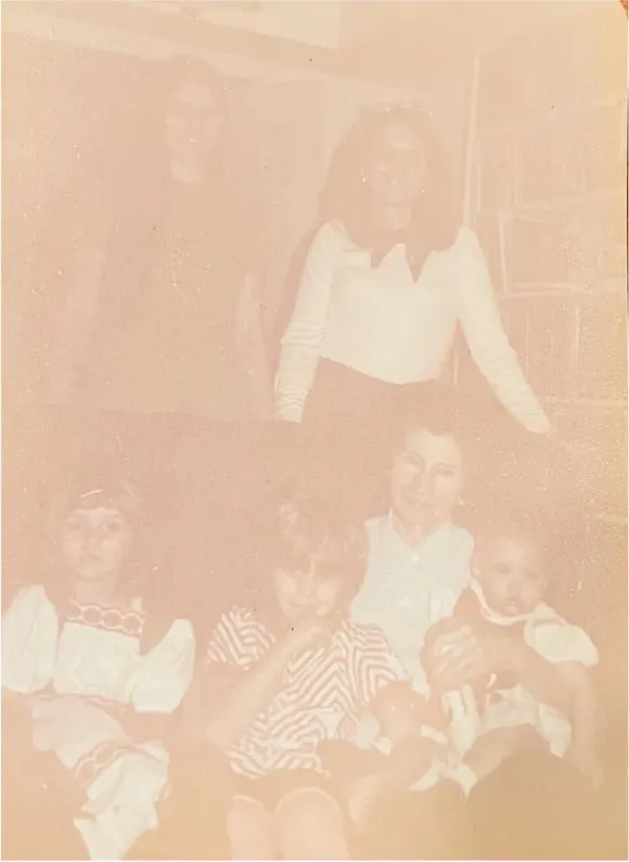 Discoloration on a 1950s-1970s photograph, before hand restoration by MemoryCherish artists