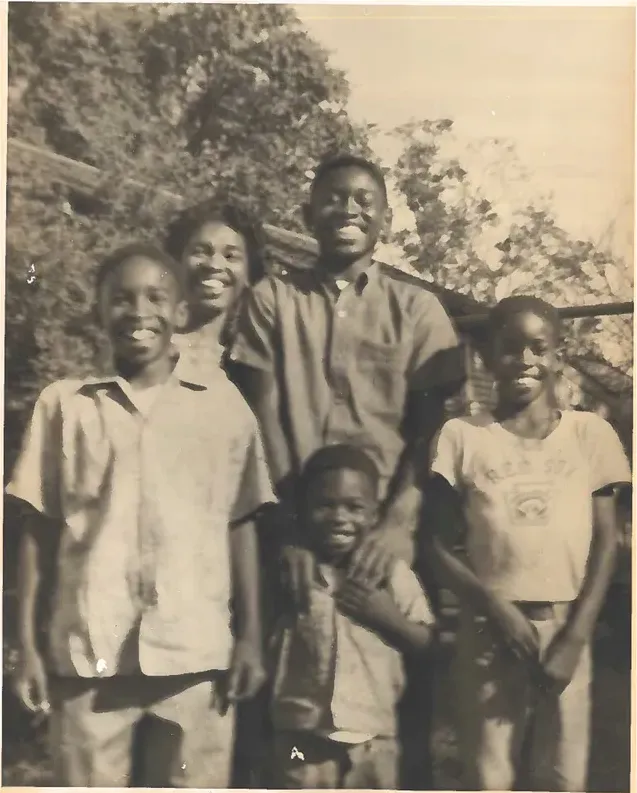 Black-and-white 1950s-1970s photograph before hand colorization by MemoryCherish artists