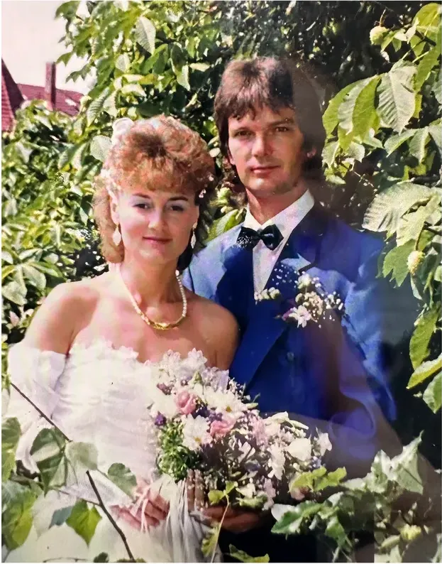 Creases and tears on a 1980s-plus photograph, before hand restoration by MemoryCherish artists