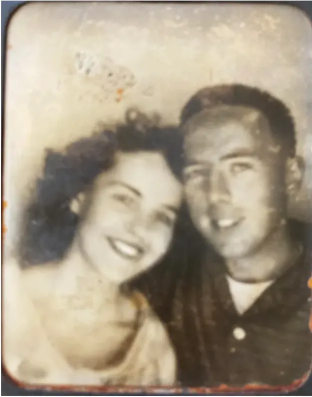Stains and marks on a pre-1950 photograph, before hand restoration by MemoryCherish artists