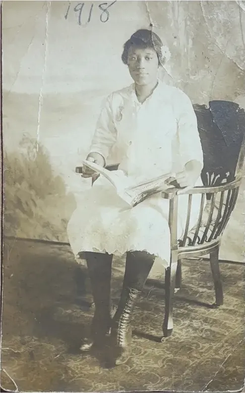 Original pre-1950 photograph showing creases and tears, before photo restoration by MemoryCherish