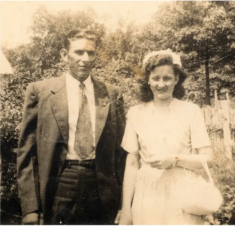 Original pre-1950 photograph showing scratches, before photo restoration by MemoryCherish