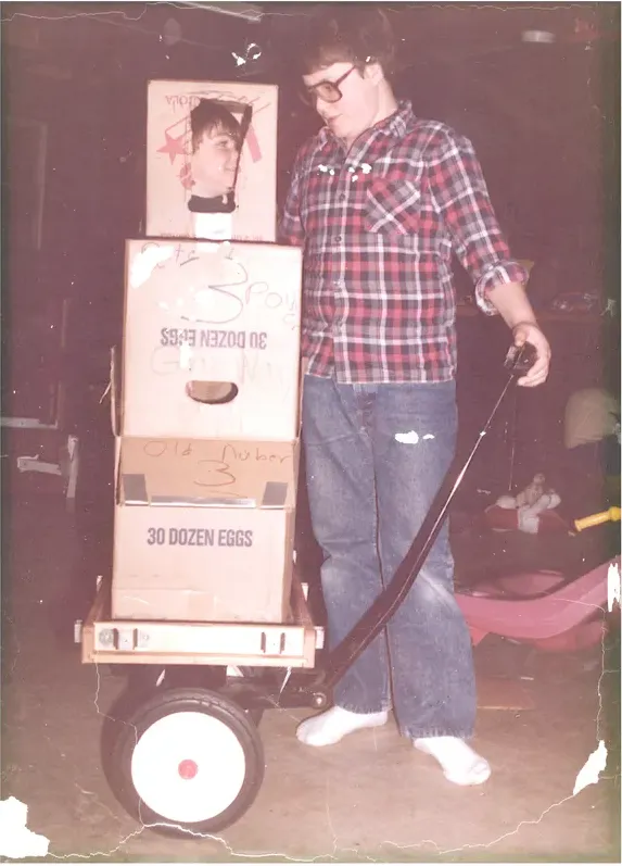 Creases and tears on a 1980s-plus photograph, before hand restoration by MemoryCherish artists