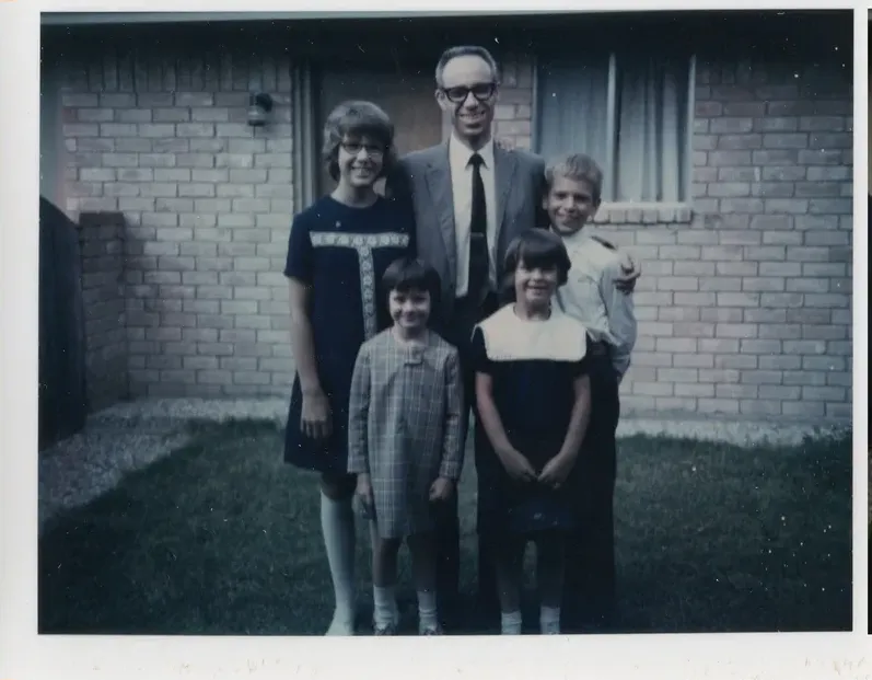 Discoloration on a 1950s-1970s photograph, before hand restoration by MemoryCherish artists