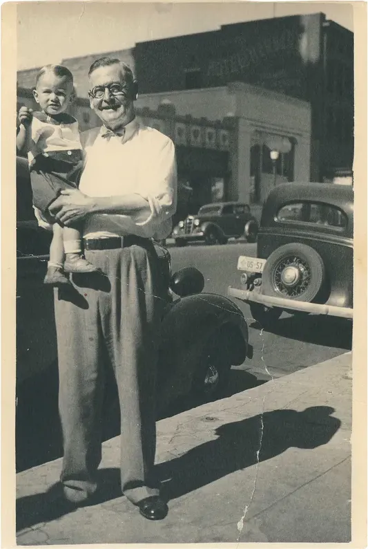 Creases and tears on a pre-1950 photograph, before hand restoration by MemoryCherish artists