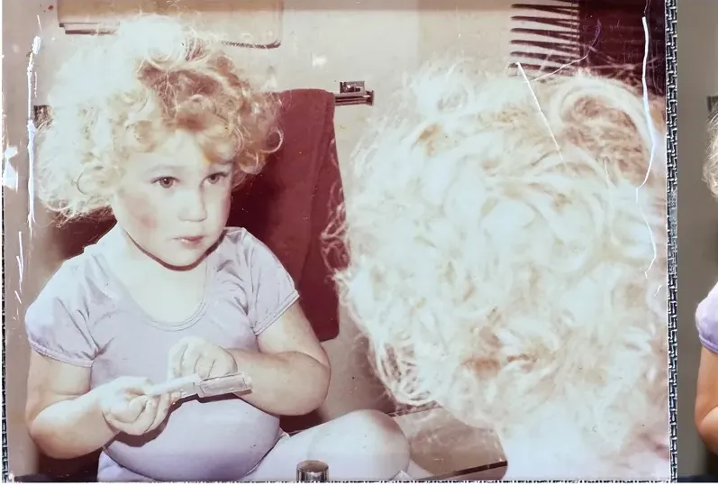 Creases and tears on a 1980s-plus photograph, before hand restoration by MemoryCherish artists