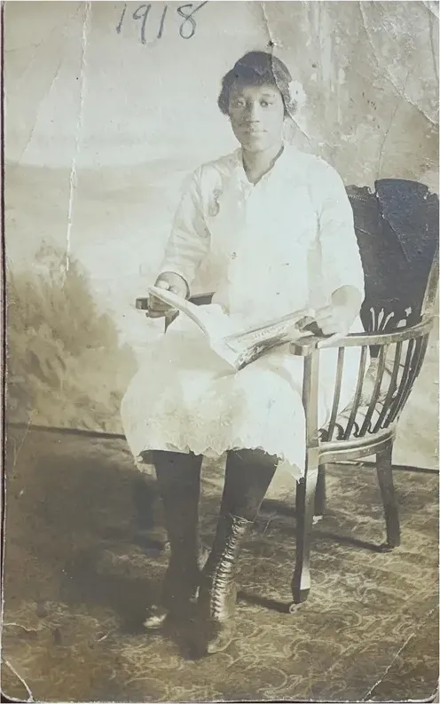 Creases and tears on a pre-1950 photograph, before hand restoration by MemoryCherish artists