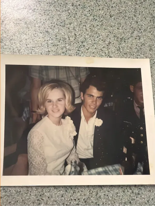 Stains and marks on a 1950s-1970s photograph, before hand restoration by MemoryCherish artists