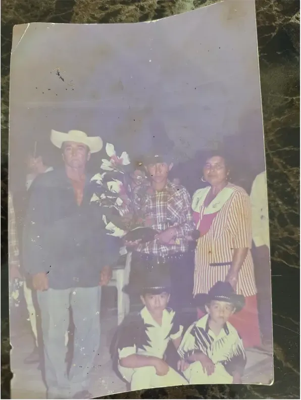 Original 1980s-plus photograph showing water damage, before photo restoration by MemoryCherish