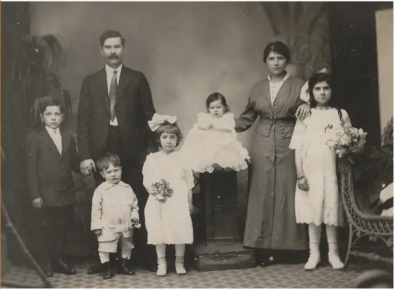 Black-and-white pre-1950 photograph before hand colorization by MemoryCherish artists