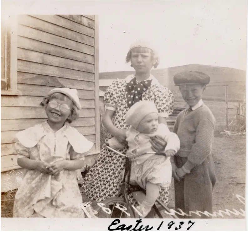 Fading on a pre-1950 photograph, before hand restoration by MemoryCherish artists