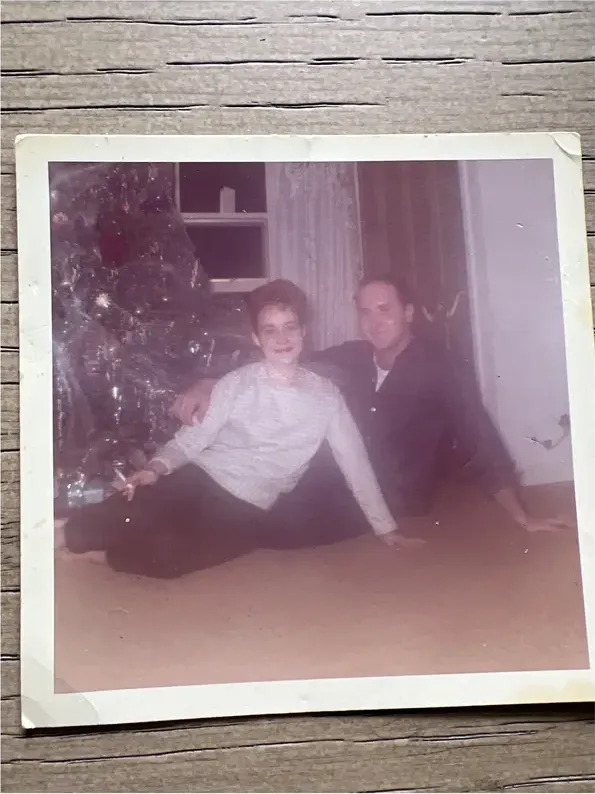 Creases and tears on a 1950s-1970s photograph, before hand restoration by MemoryCherish artists