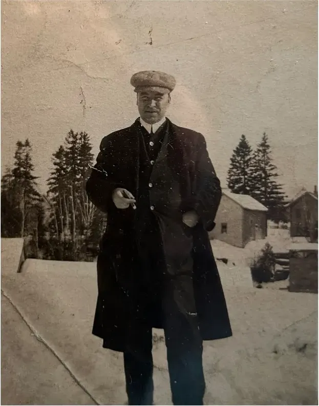 Original pre-1950 photograph showing creases and tears, before photo restoration by MemoryCherish