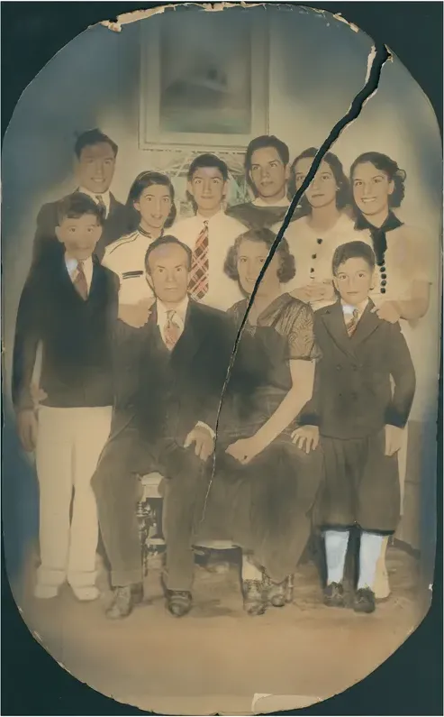 Water damage on a pre-1950 photograph, before hand restoration by MemoryCherish artists
