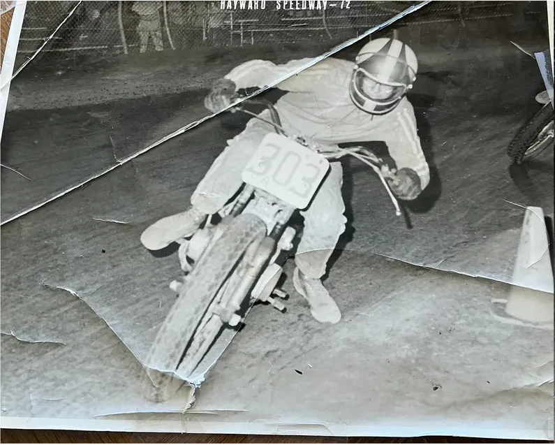 Creases and tears on a 1950s-1970s photograph, before hand restoration by MemoryCherish artists