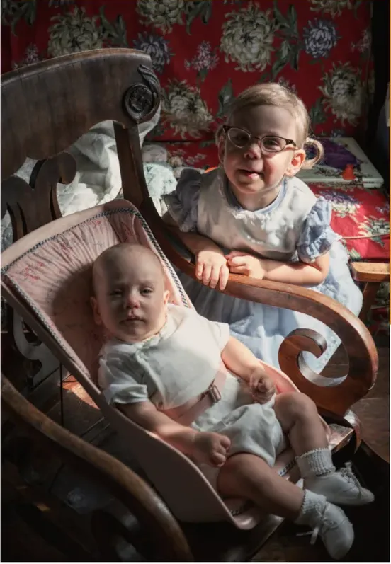 The same 1950s-1970s photo restored by hand at MemoryCherish, stains and marks corrected and clarity brought back