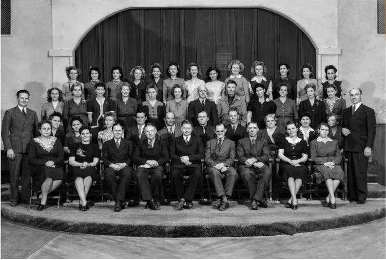 The same pre-1950 photo restored by hand at MemoryCherish, creases and tears corrected and clarity brought back