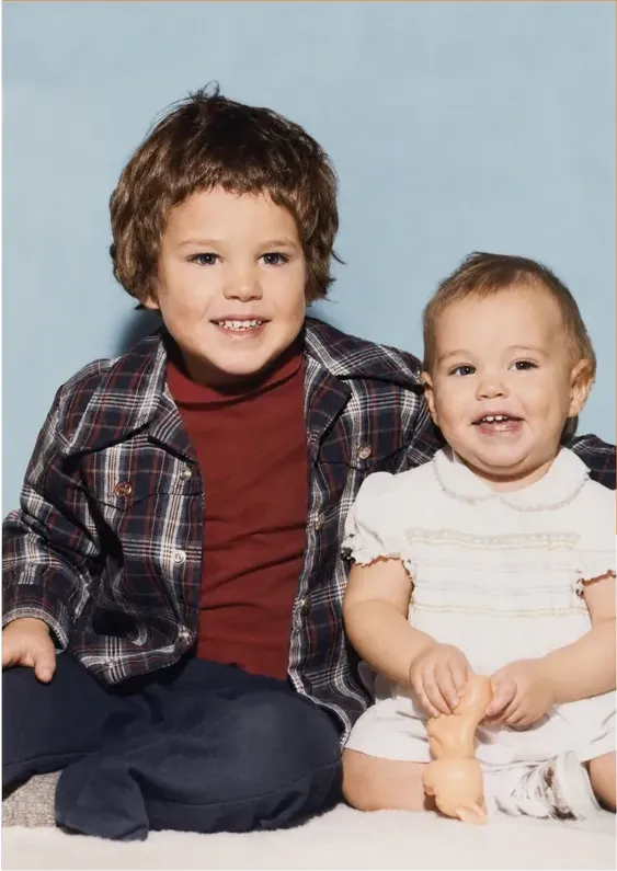 The same 1950s-1970s photo restored by hand at MemoryCherish, discoloration corrected and clarity brought back