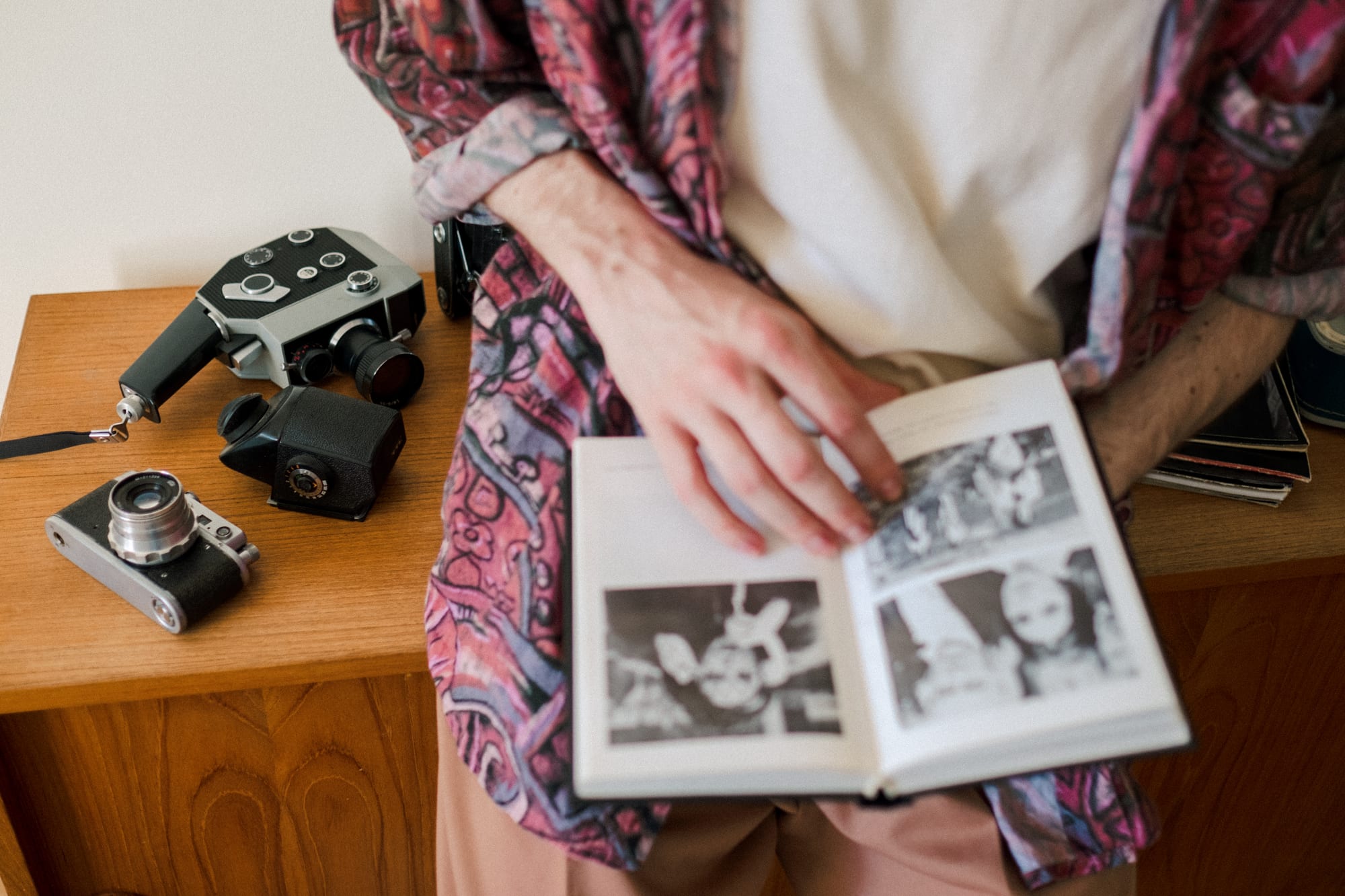 Free Man Looking Through Photo Album Stock Photo