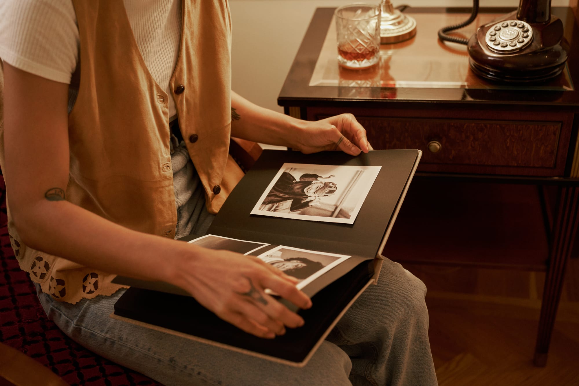 Free Close-Up View of Woman Watching Photo Album Stock Photo
