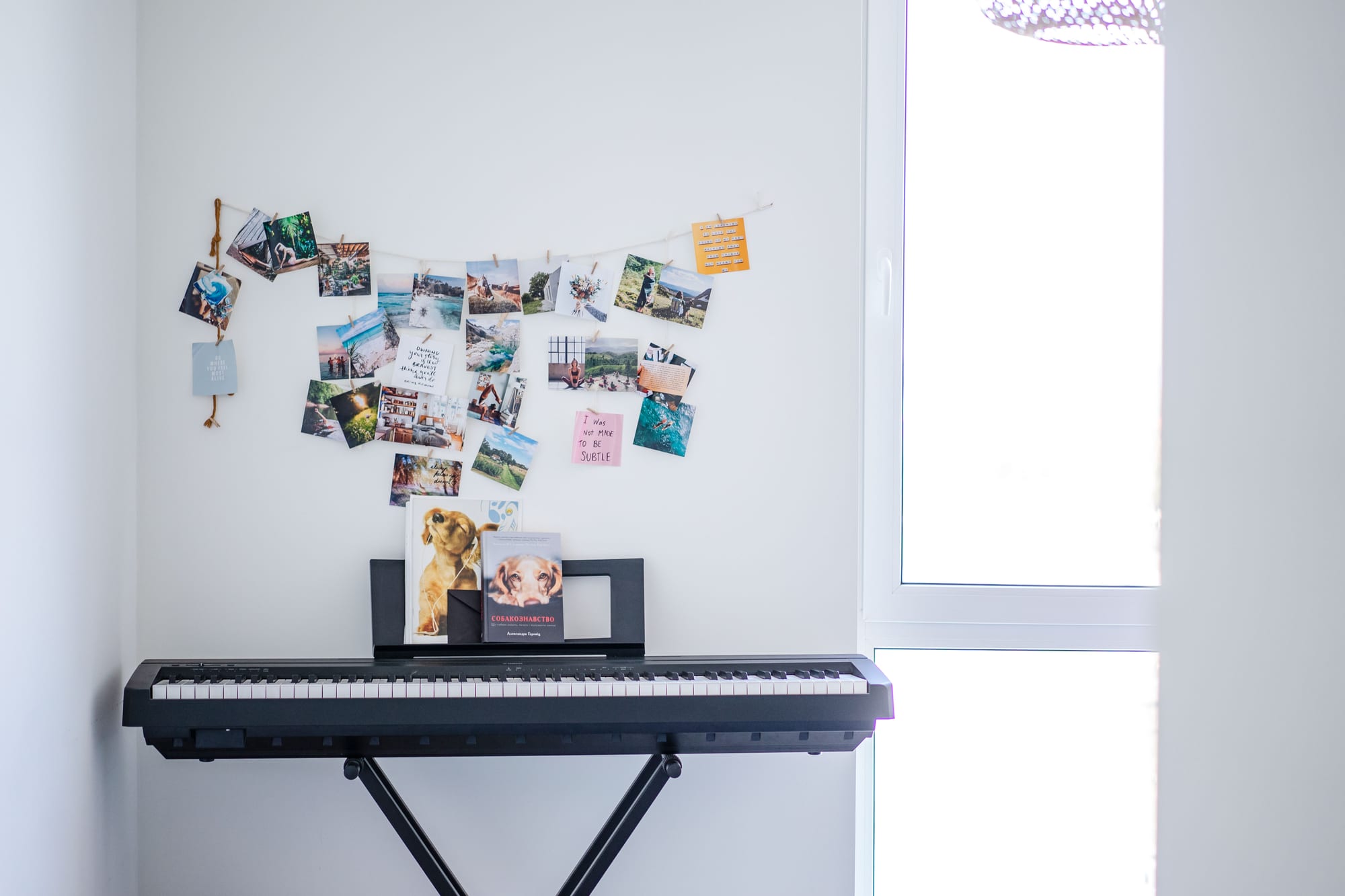 Free Photos on White Wall Near Black Table Stock Photo