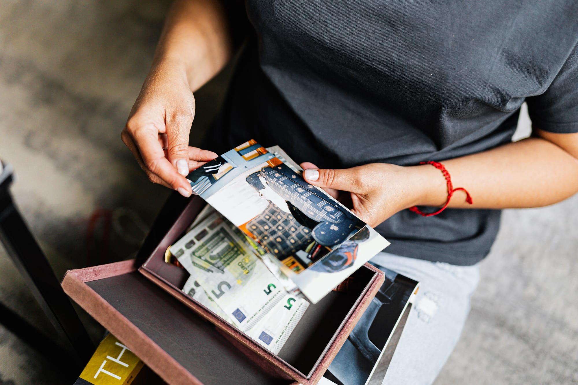 Free Hands of a Person Holding Photographs Stock Photo