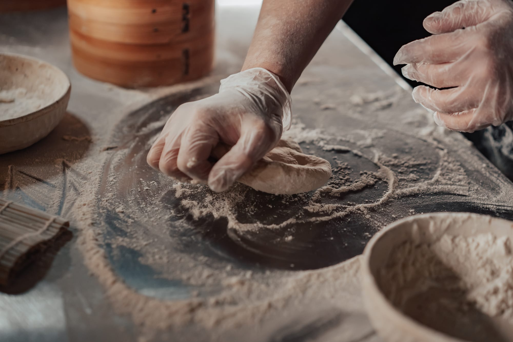 Free Person Kneading Dough on Stainless Steel Table Stock Photo