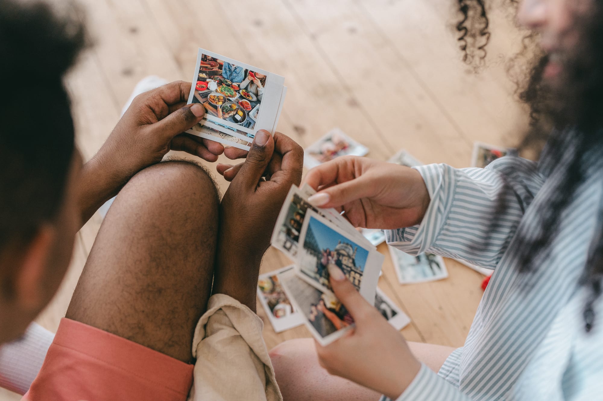 Free A Couple Looking at Photos Stock Photo