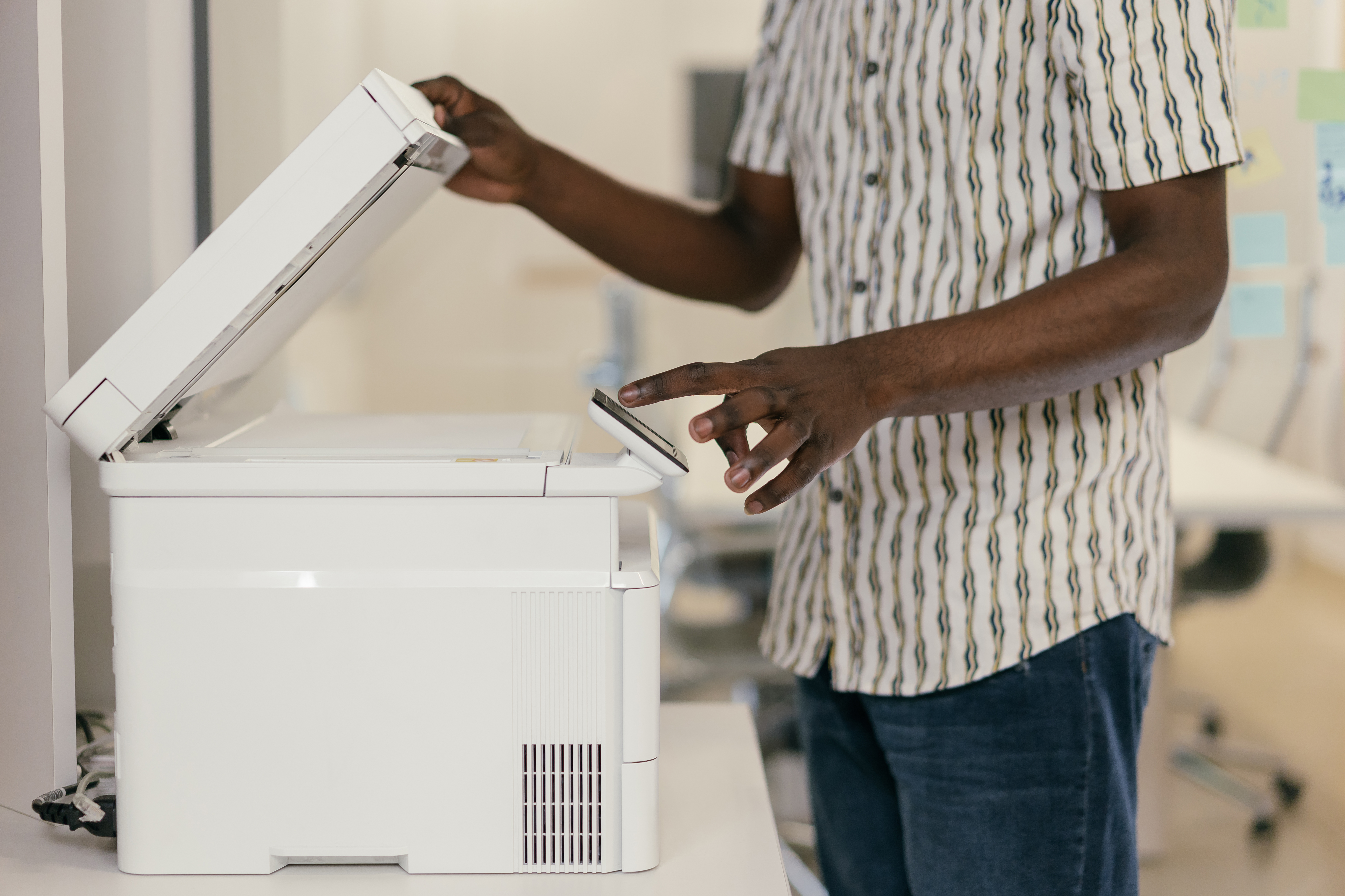 Free Person Using a Photocopier Stock Photo